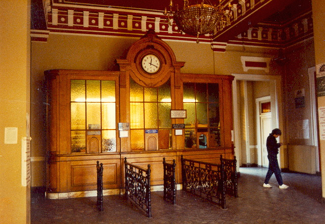 Railway Station (Piraeus-Peloponnese) - The main characteristics of the buildings are the Bouniato on the four sides, the frames of doors and windows, the false-roofs, the big wooden-bar doors, the decorating strips running across the walls of the buildings, that are all made of stone and ar